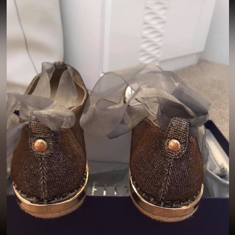 Beautiful lead-coloured espadrilles with glitter and ribbon to tie at the ankle